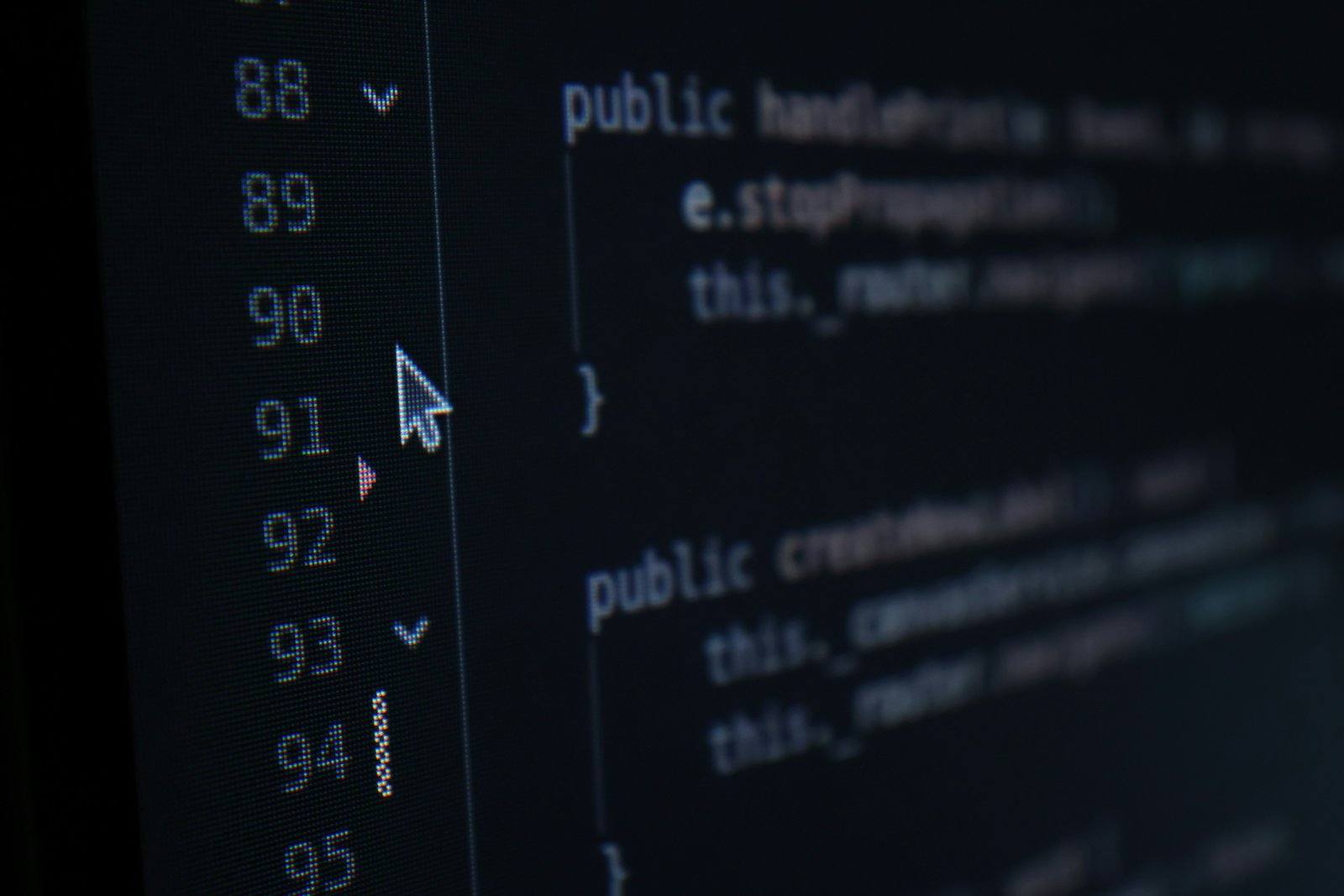 Close-up of code on a dark screen